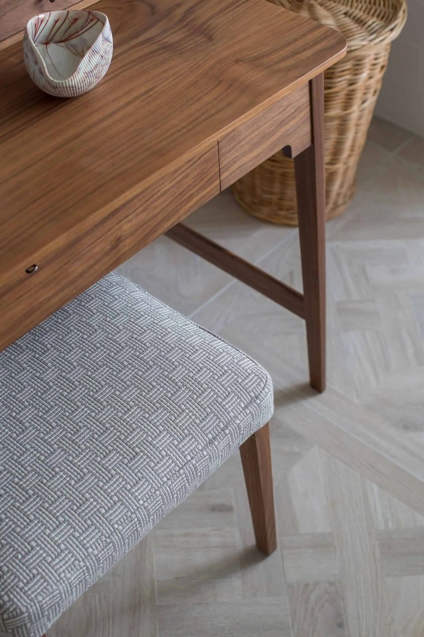 Walnut dressing table and stool on woodgrain porcelain panel floor