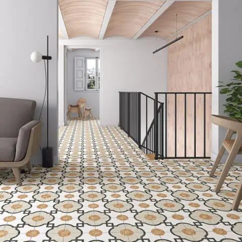 Hallway floor in a cream, ochre and black floral pattern tile