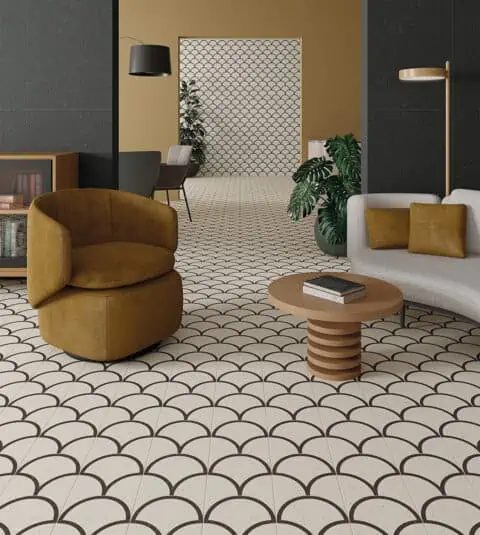 Living space floor in a cream and black scallop pattern tile